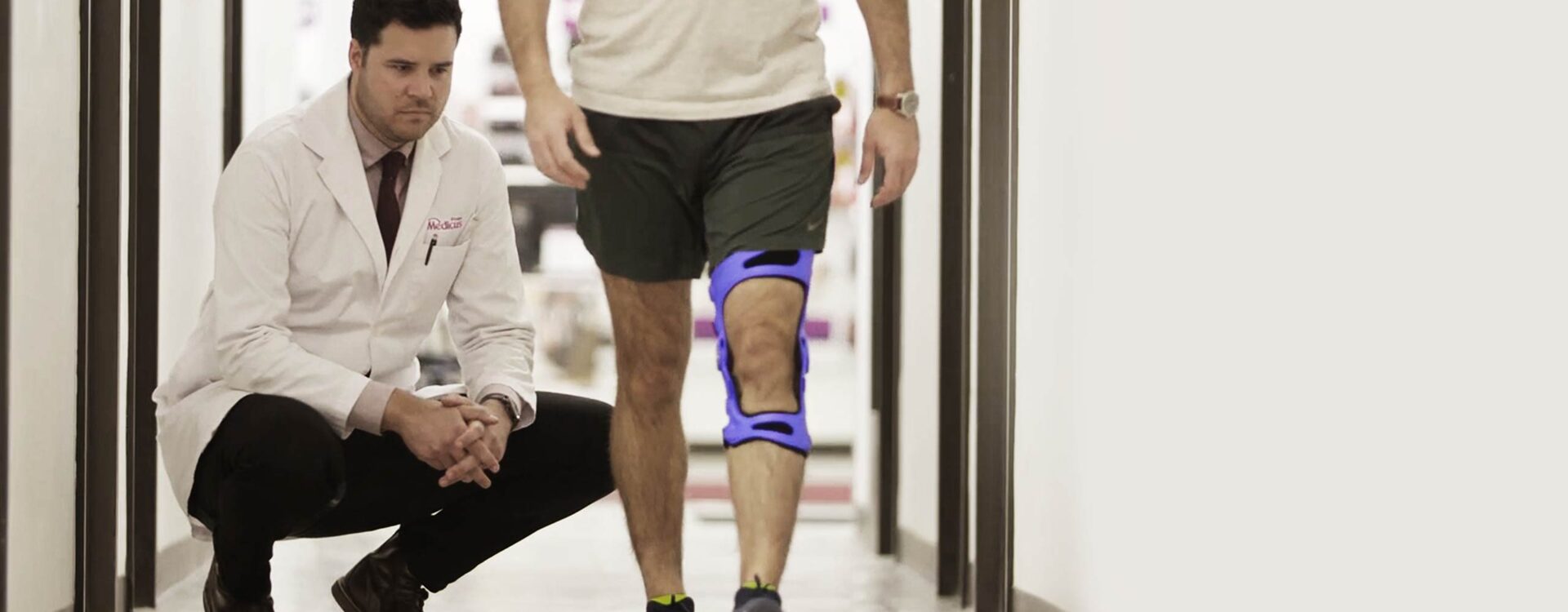 Man wearing an unloader knee brace